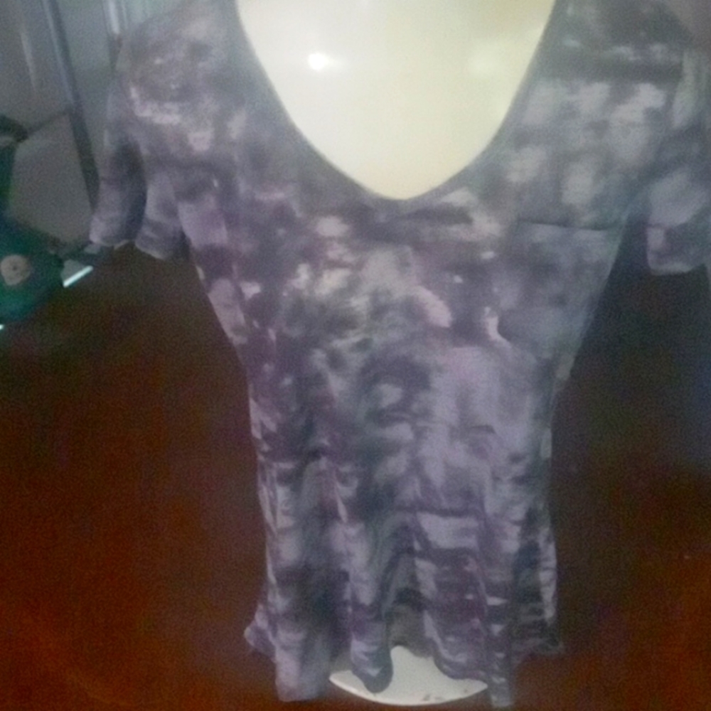 Large t-shirt with cute back it is cotton material and in great condition.